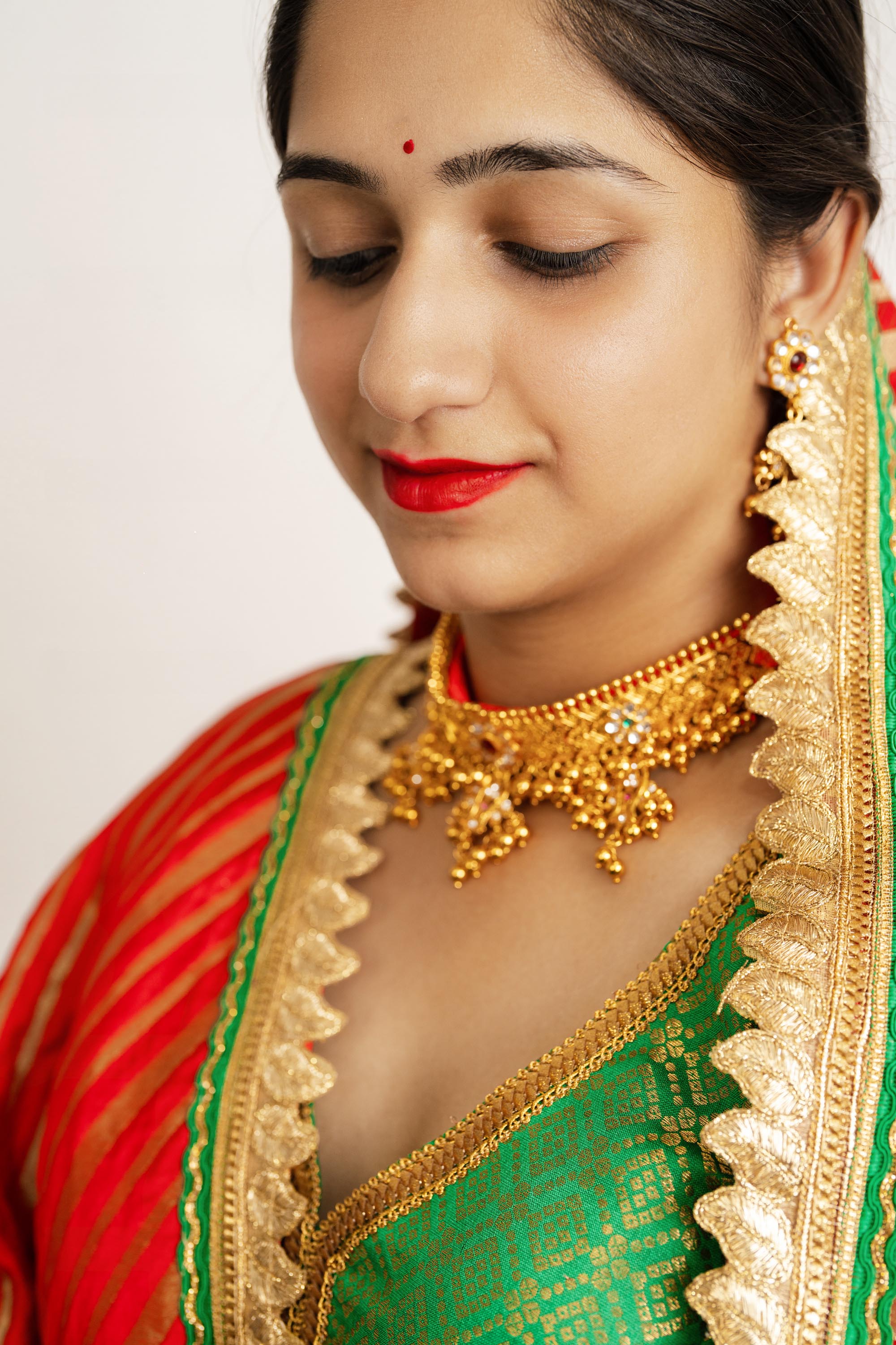 Red & Green Brocade V Neck Lehenga