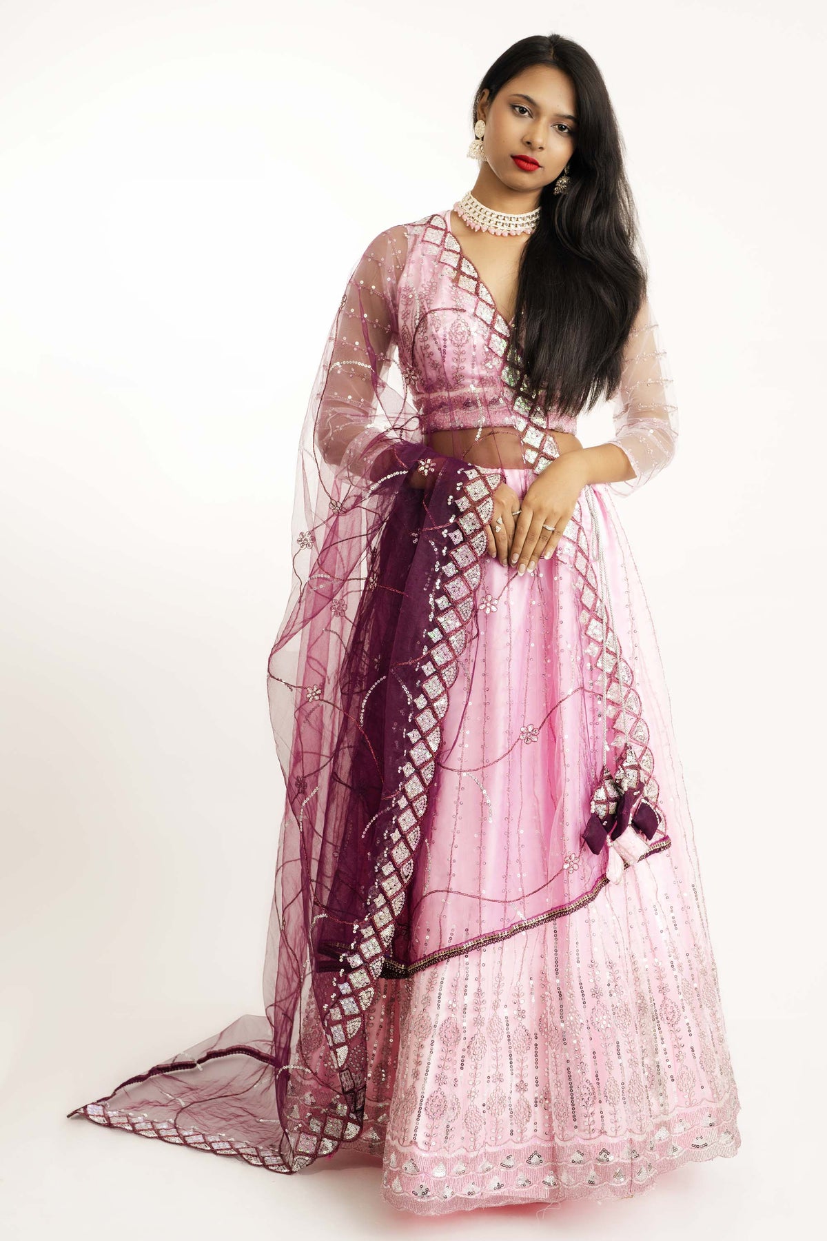 Pink Full Sleeves Net Lehenga with Tassels